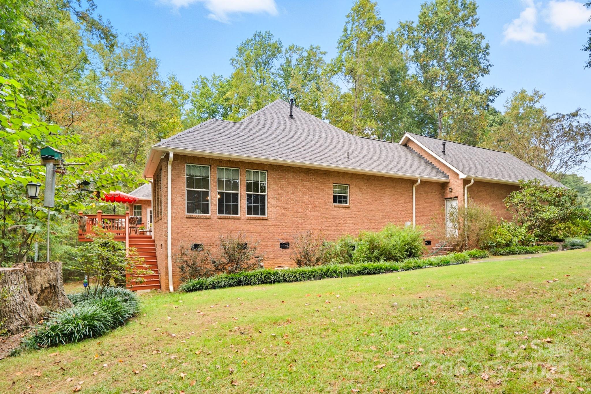 316 Brigadier Drive Clover, SC 29710 - Photo 43 of 47 a house with trees in the background