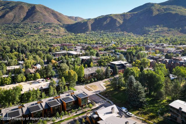 a view of a lake and lots of trees