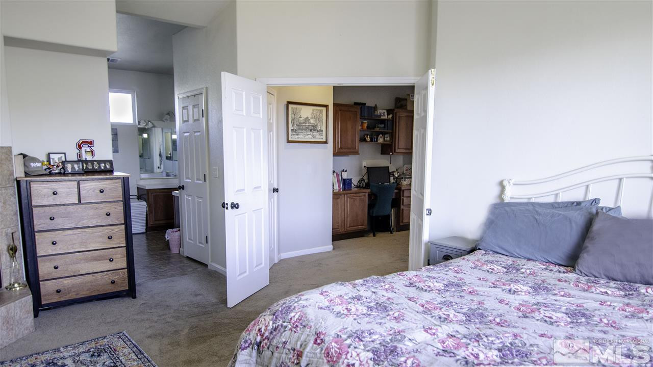 7500 Celeste Drive Reno, NV 89511 - Photo 13 of 20 a bedroom with a bed and a cabinets