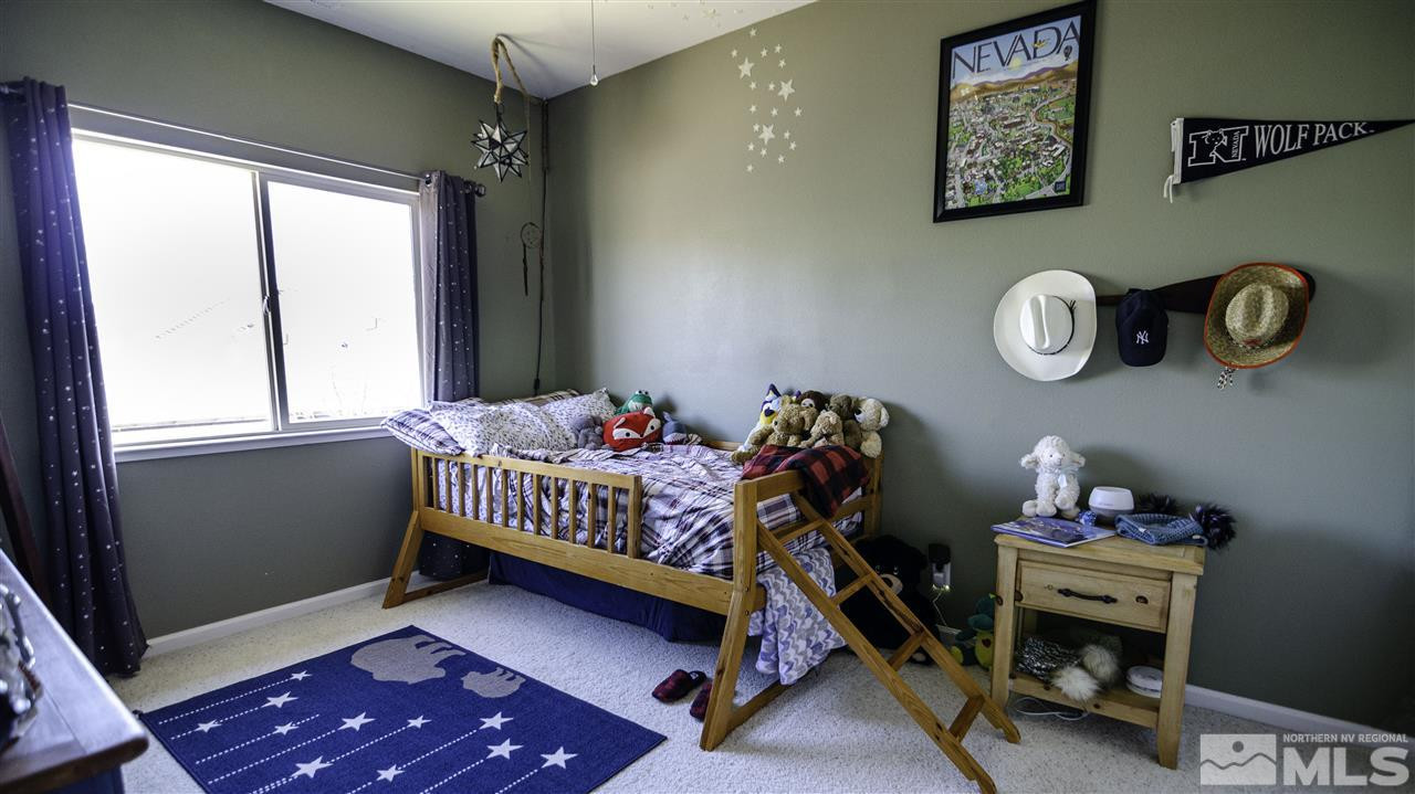 7500 Celeste Drive Reno, NV 89511 - Photo 15 of 20 a room with toys and a window