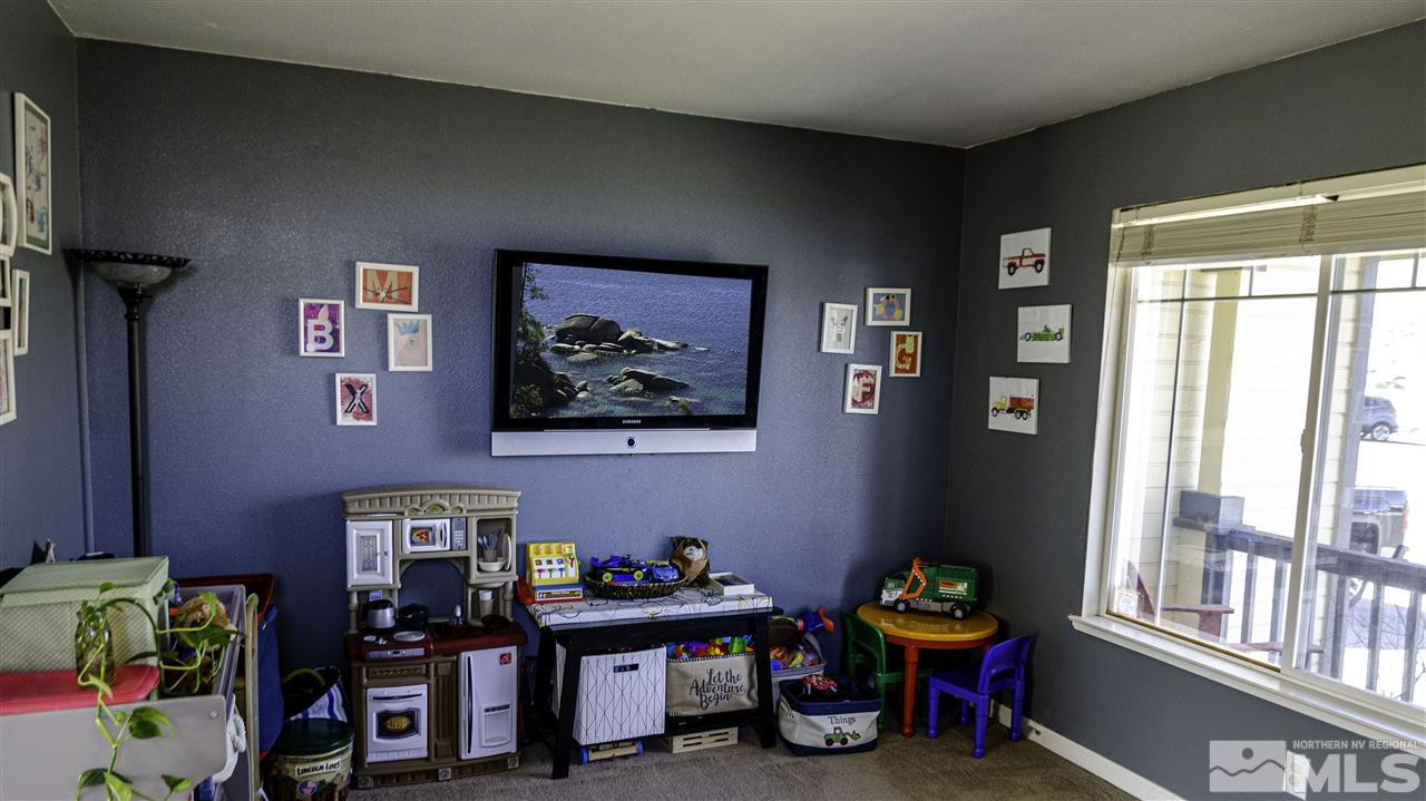 7500 Celeste Drive Reno, NV 89511 - Photo 6 of 20 a living room with furniture and a window