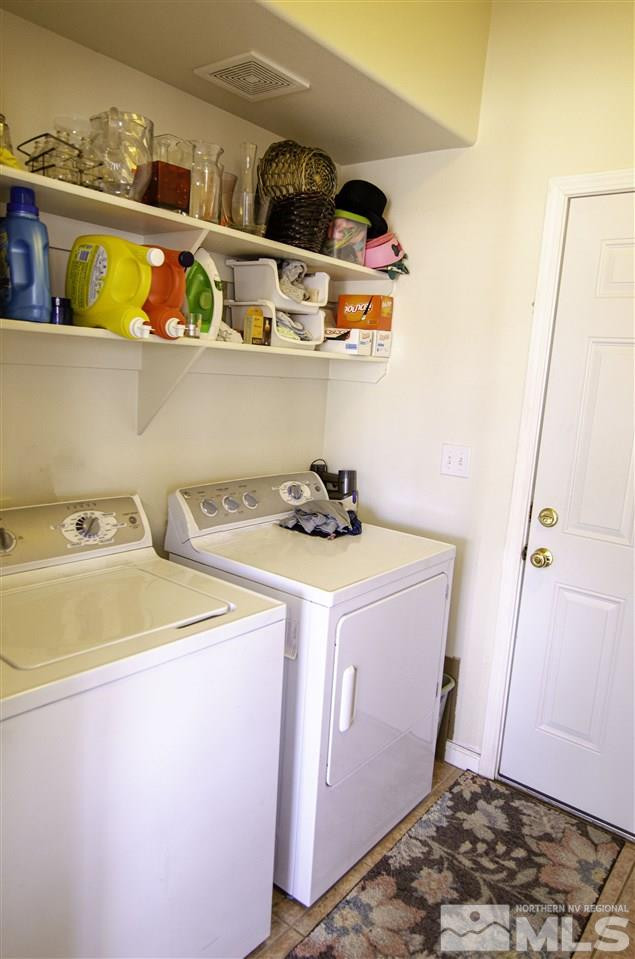 7500 Celeste Drive Reno, NV 89511 - Photo 8 of 20 a utility room with dryer and washer