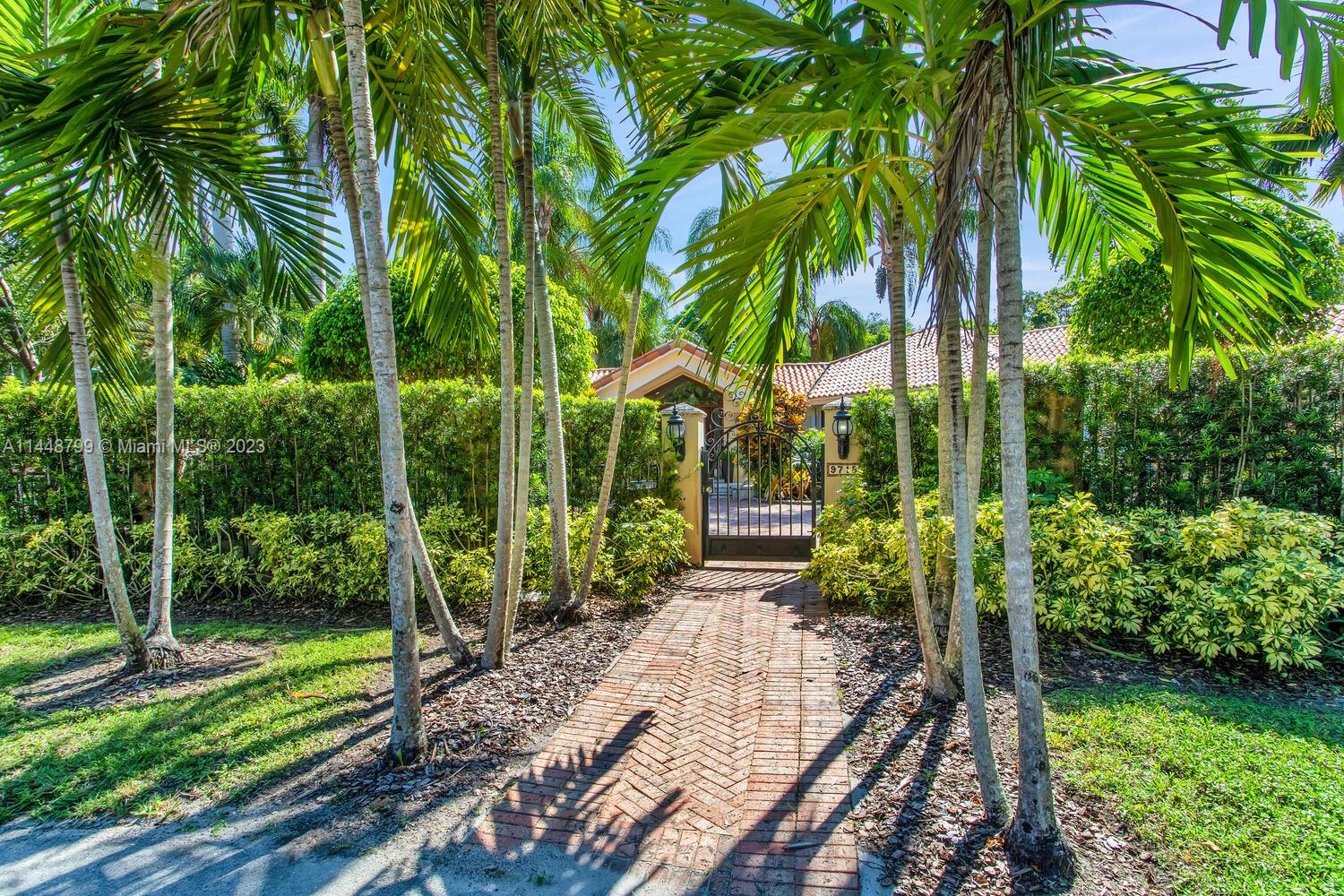 9718 Southwest 58th Court Pinecrest, FL 33156 - Photo 2 of 35 a view of small garden