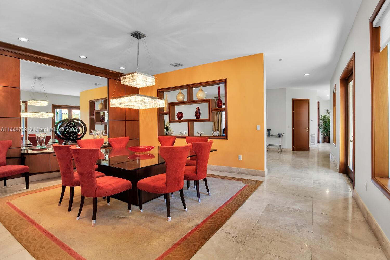9718 Southwest 58th Court Pinecrest, FL 33156 - Photo 8 of 35 a dining room with furniture and window