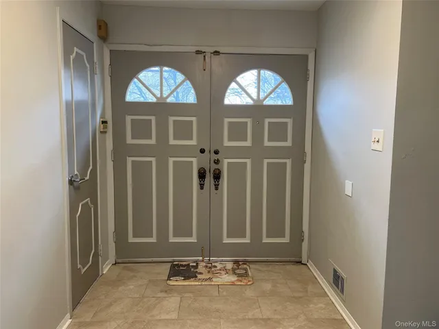 a view of entryway with stairs