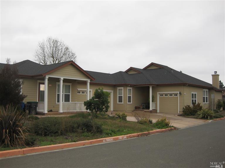 2248-2250 Marsh Road Santa Rosa, CA 95403 - Photo 1 of 1 a front view of a house with a yard and garage