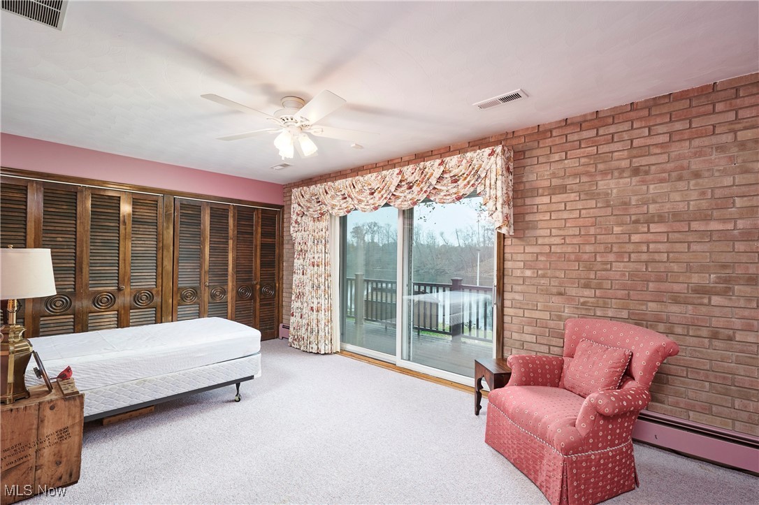 2671 Spring Valley Boulevard Mogadore, OH 44260 - Photo 10 of 23 Primary Bedroom with door to deck