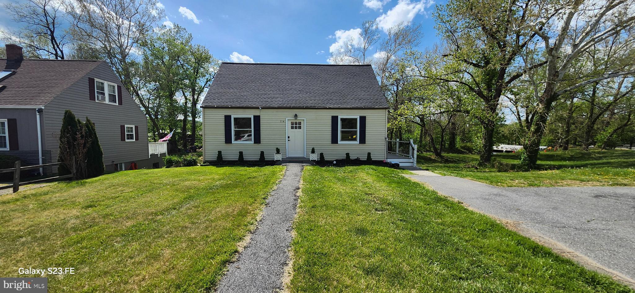 714 Crosby Road Front Royal, VA 22630 - Photo 1 of 37 a view of a house with a yard and large tree