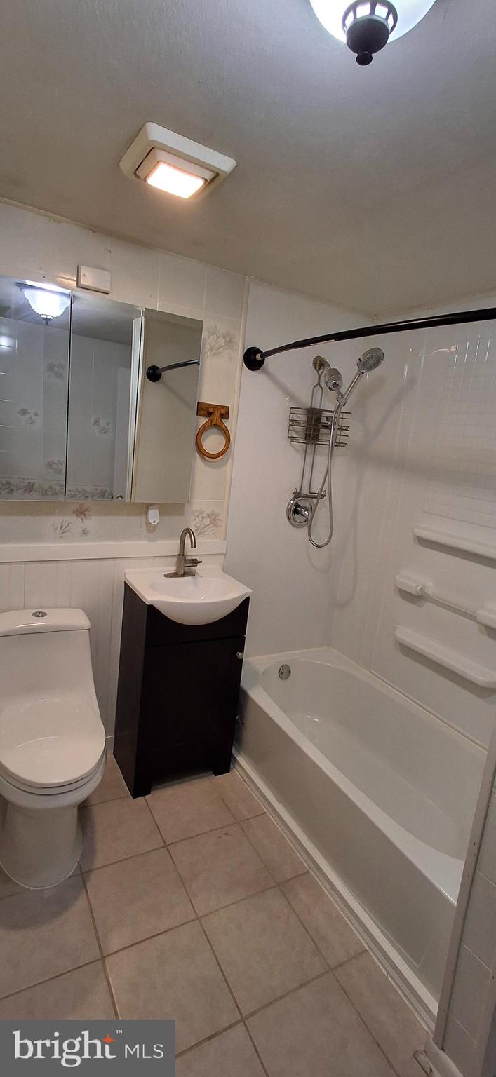 714 Crosby Road Front Royal, VA 22630 - Photo 15 of 37 a bathroom with a sink a toilet and bathtub