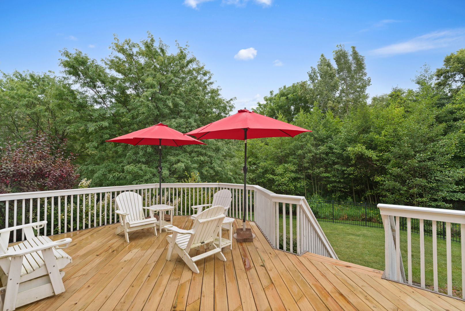 1476 Wildmeadow Road Round Lake, IL 60073 - Photo 23 of 37 a view of balcony with wooden deck and outdoor seating