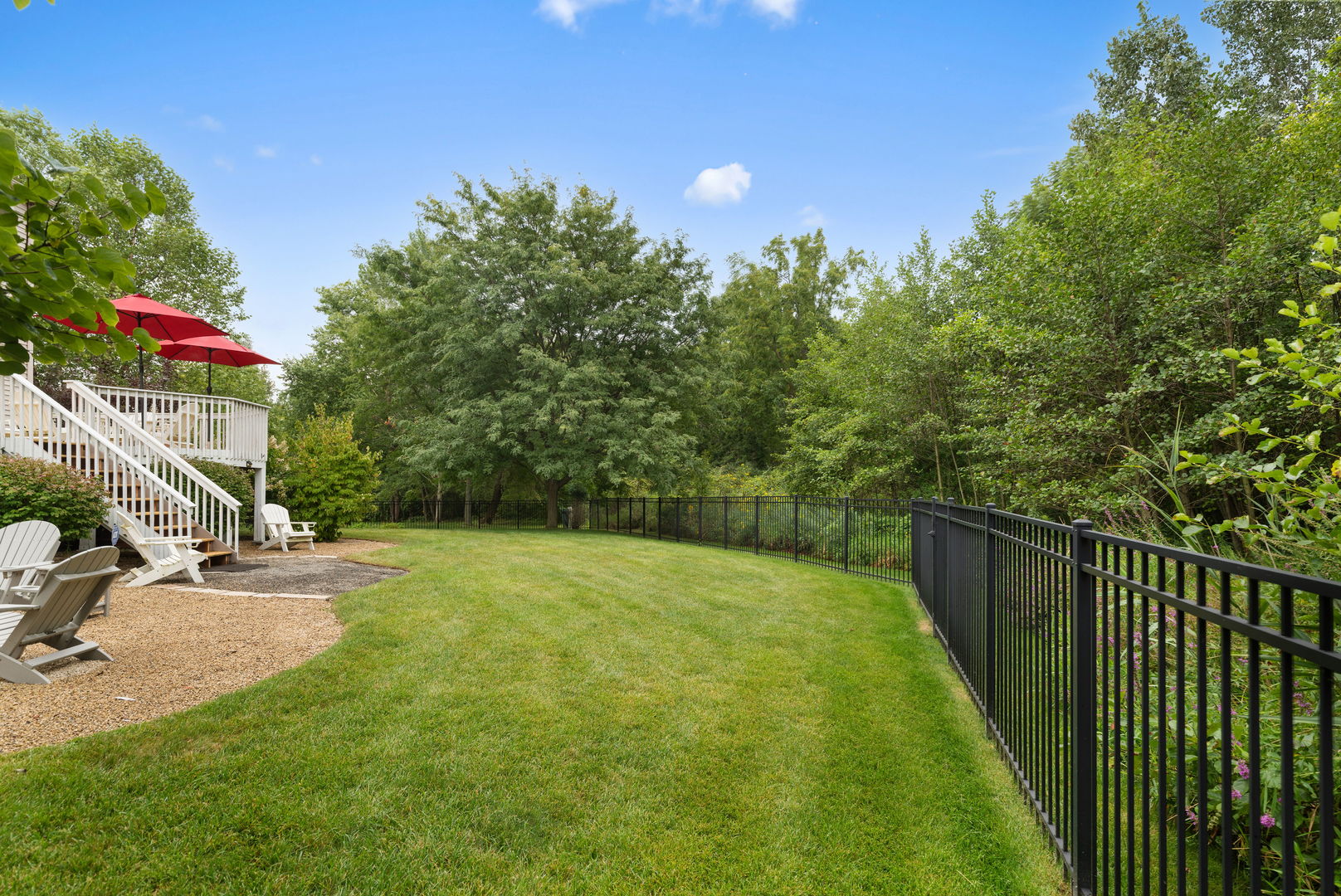 1476 Wildmeadow Road Round Lake, IL 60073 - Photo 24 of 37 a view of a backyard with a tree