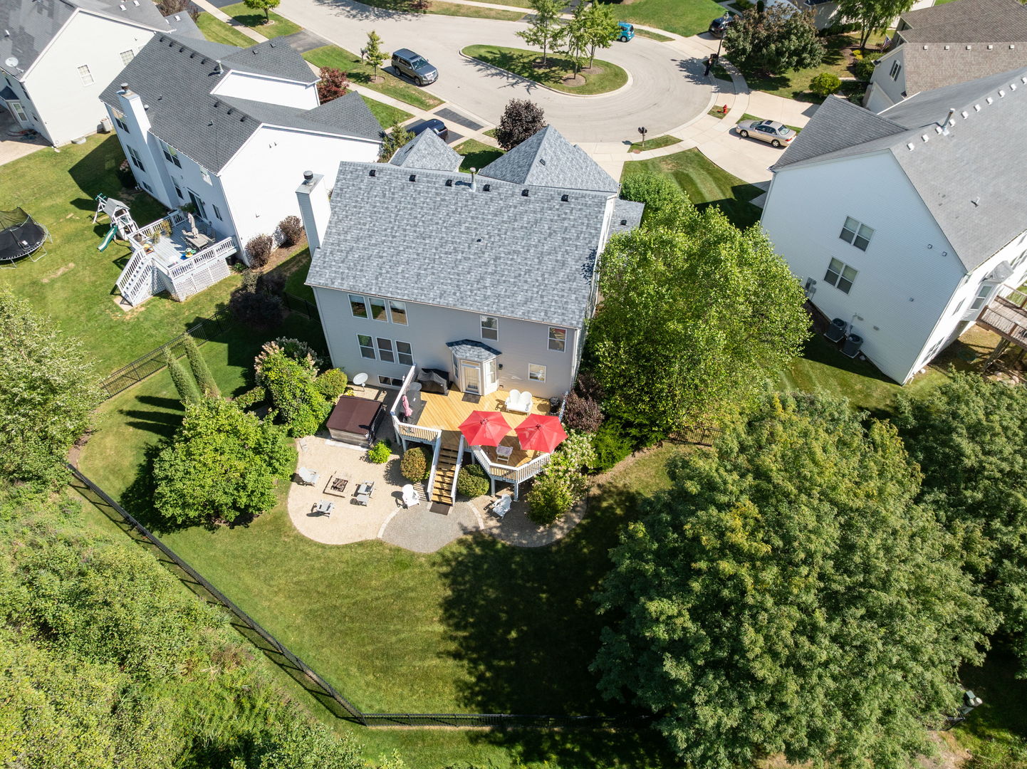 1476 Wildmeadow Road Round Lake, IL 60073 - Photo 31 of 37 an aerial view of a house with a yard and sitting area