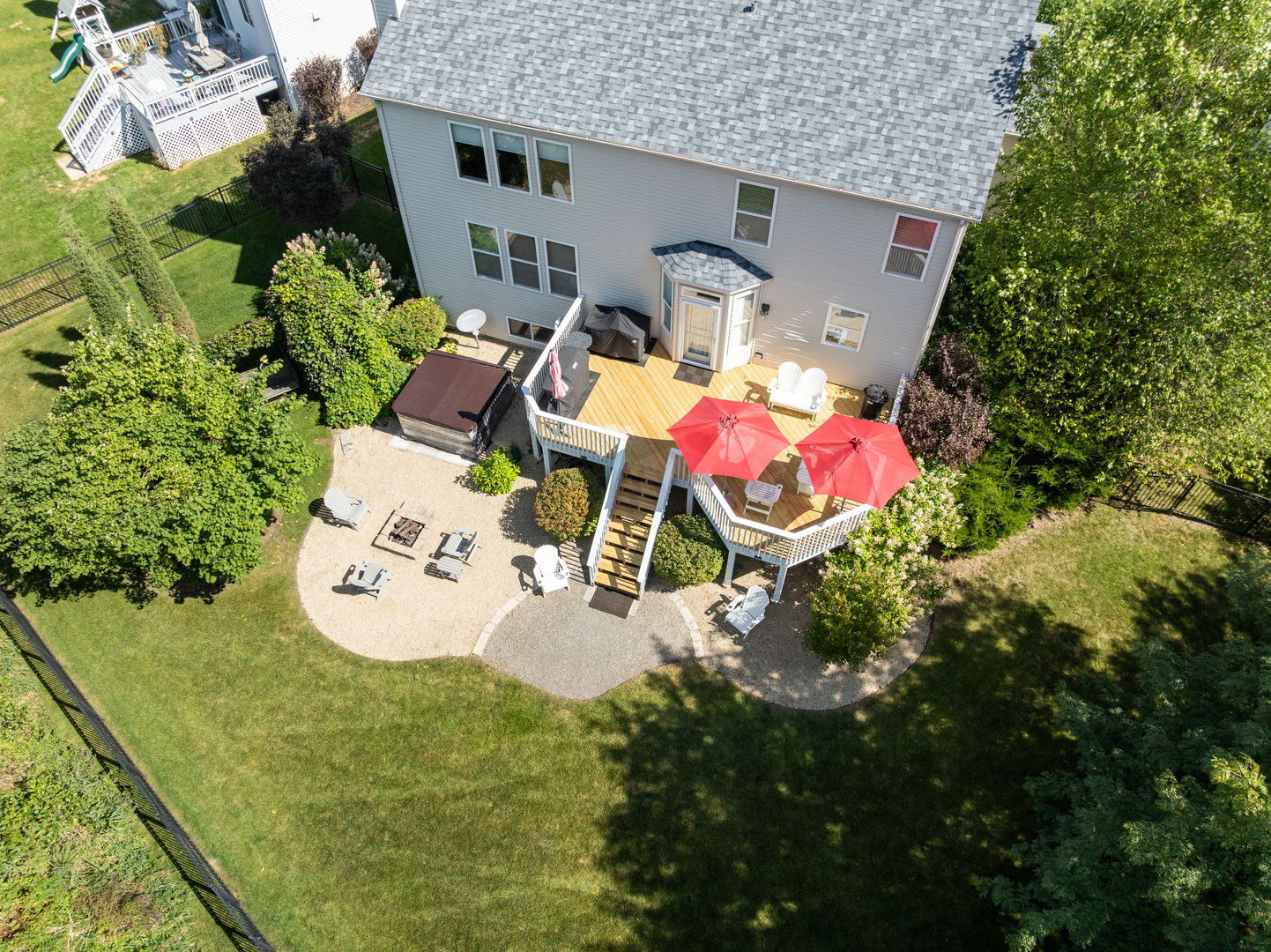 1476 Wildmeadow Road Round Lake, IL 60073 - Photo 32 of 37 an aerial view of a house with table and chairs and potted plants