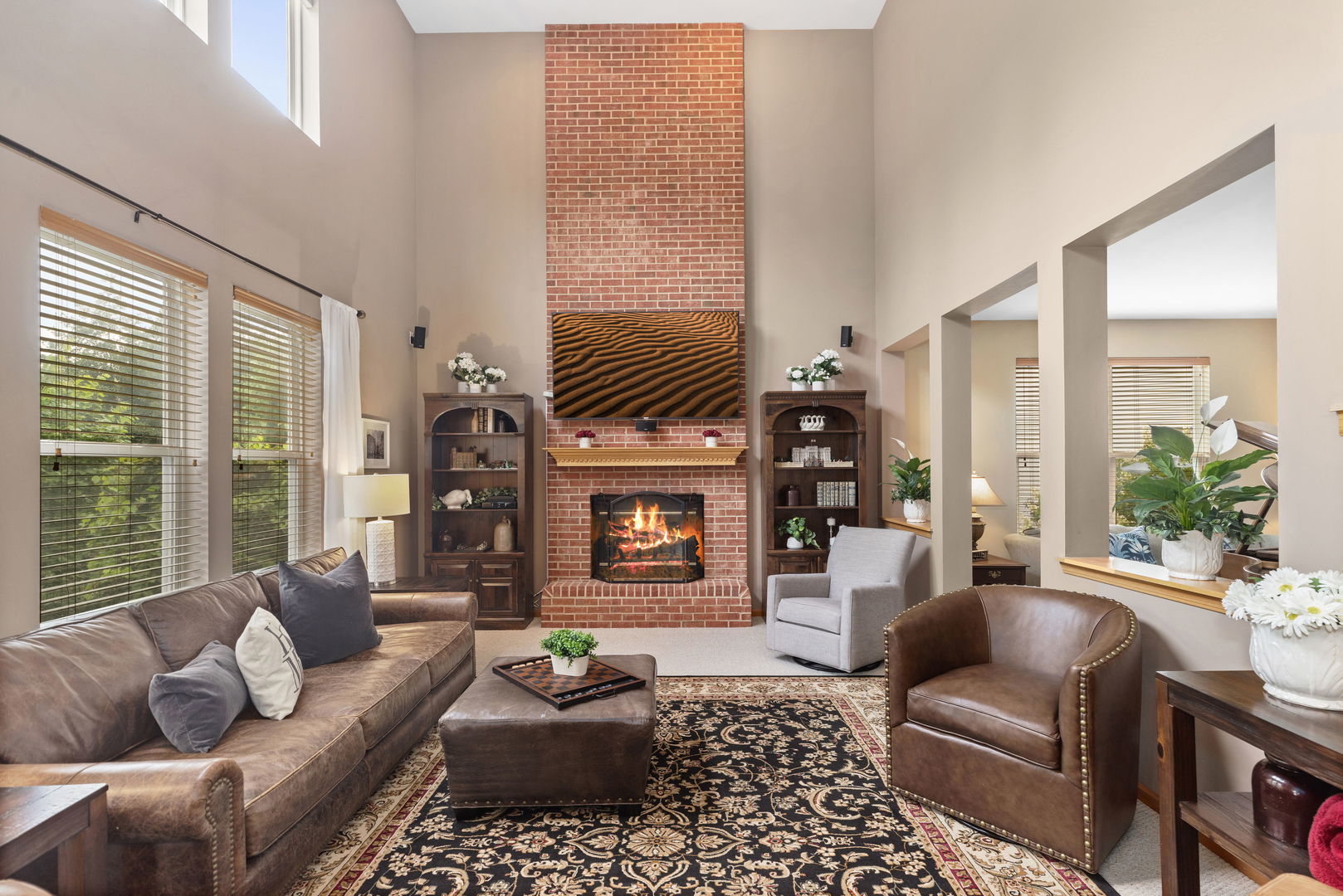 1476 Wildmeadow Road Round Lake, IL 60073 - Photo 5 of 37 a living room with furniture and a fireplace