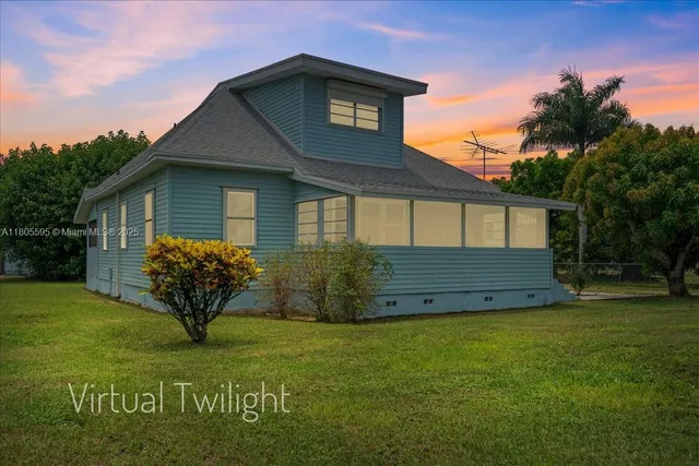 a view of a house with garden