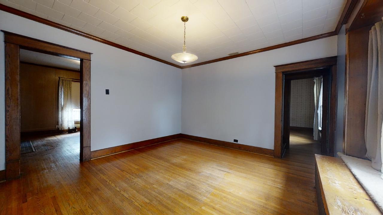 208 East State Street Fairmount, IL 61841 - Photo 12 of 42 a view of an empty room with wooden floor