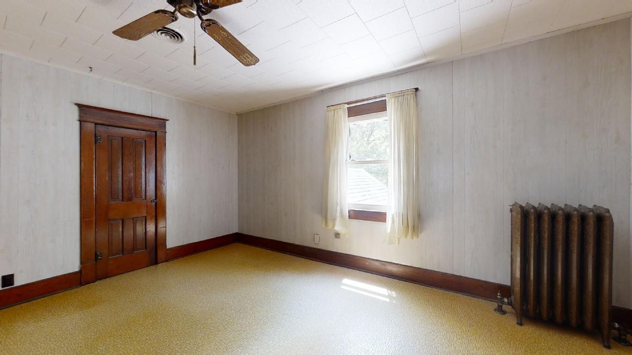 208 East State Street Fairmount, IL 61841 - Photo 27 of 42 a view of an empty room with a window