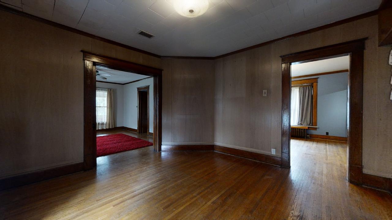 208 East State Street Fairmount, IL 61841 - Photo 8 of 42 a view of a room with wooden floor