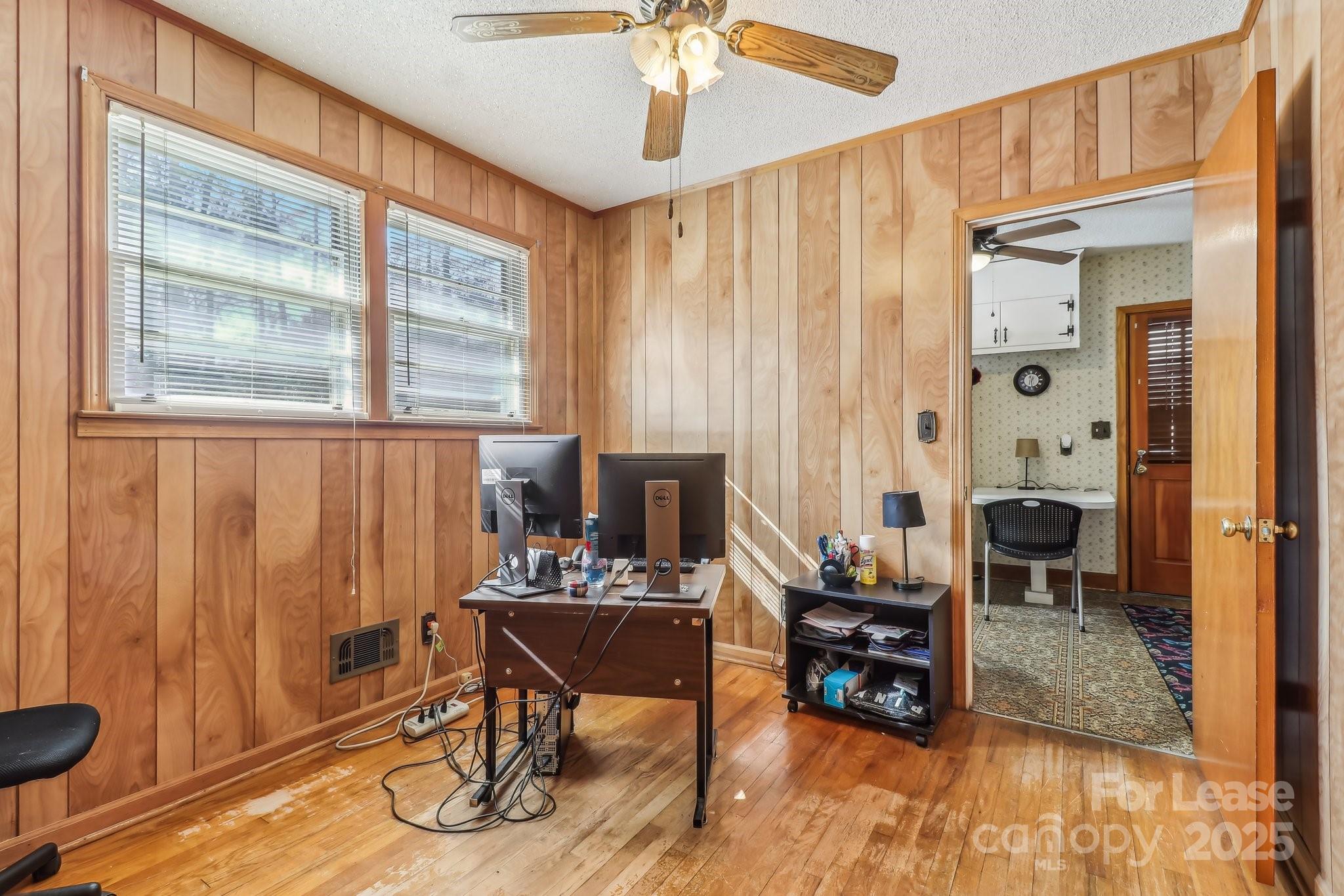 3422 Covenant Road Columbia, SC 29204 - Photo 13 of 27 a living room with furniture a fireplace and a table
