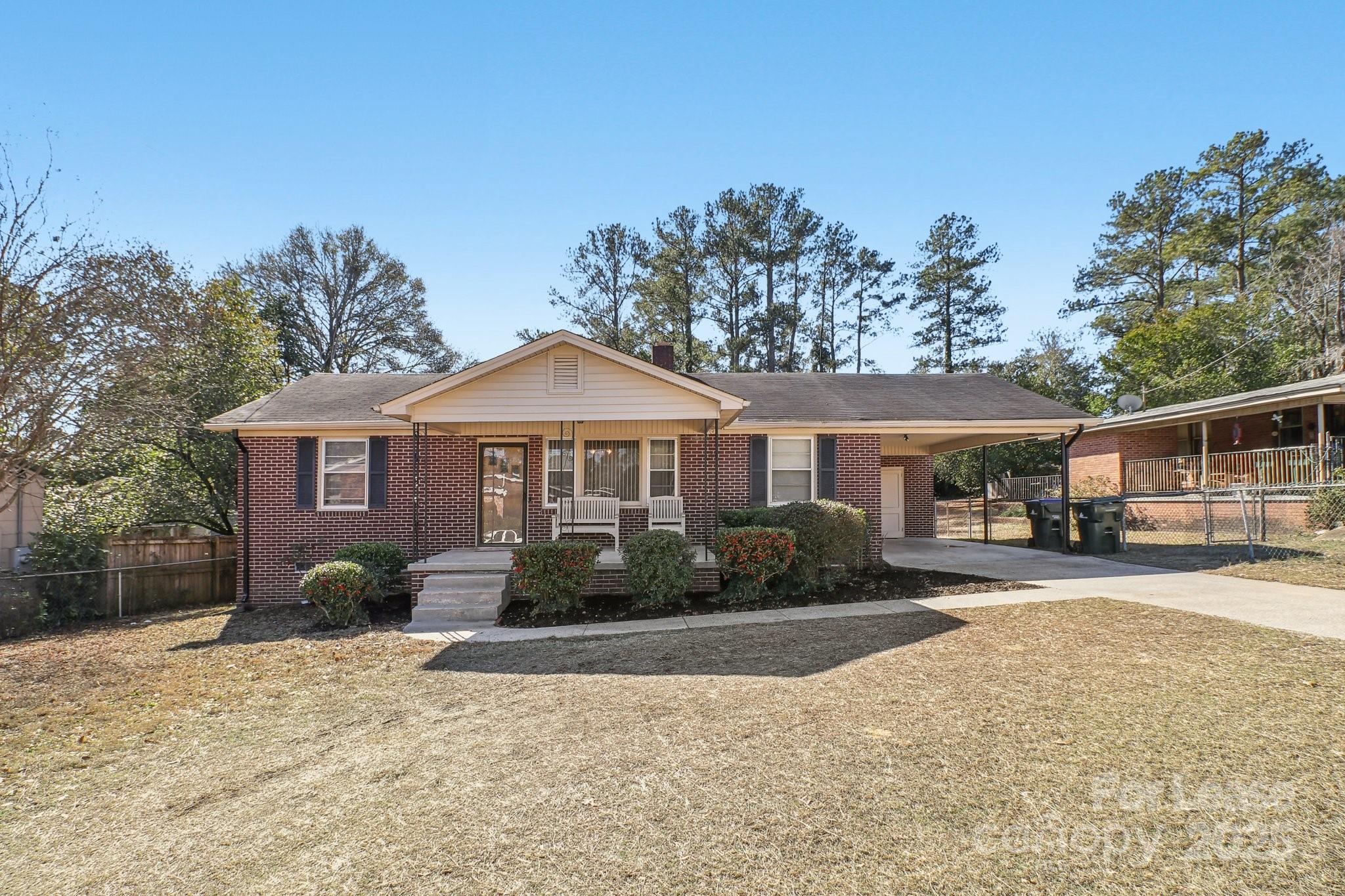 3422 Covenant Road Columbia, SC 29204 - Photo 2 of 27 a front view of a house with a yard and trees