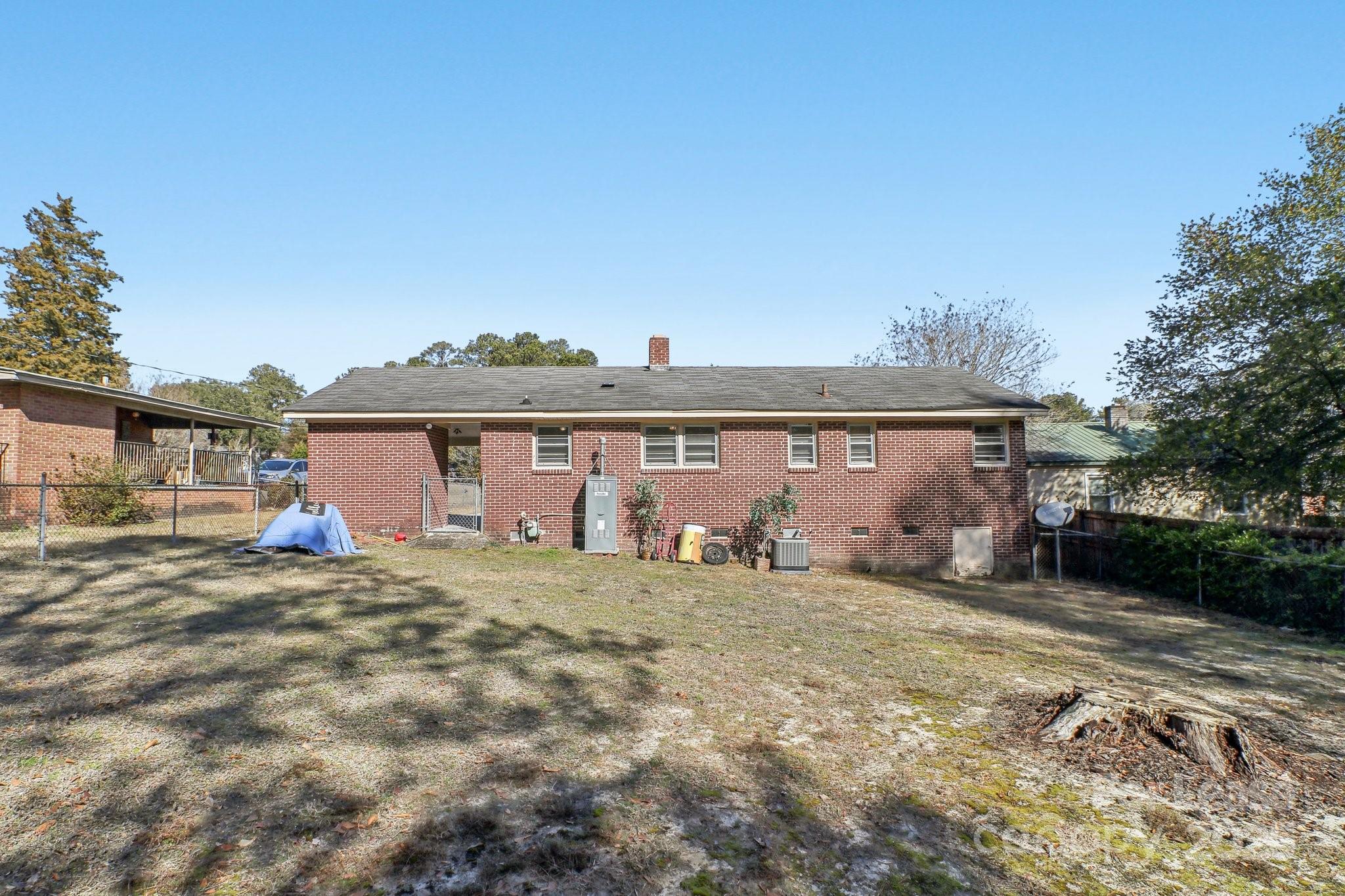 3422 Covenant Road Columbia, SC 29204 - Photo 25 of 27 a view of a house with a big yard and large tree