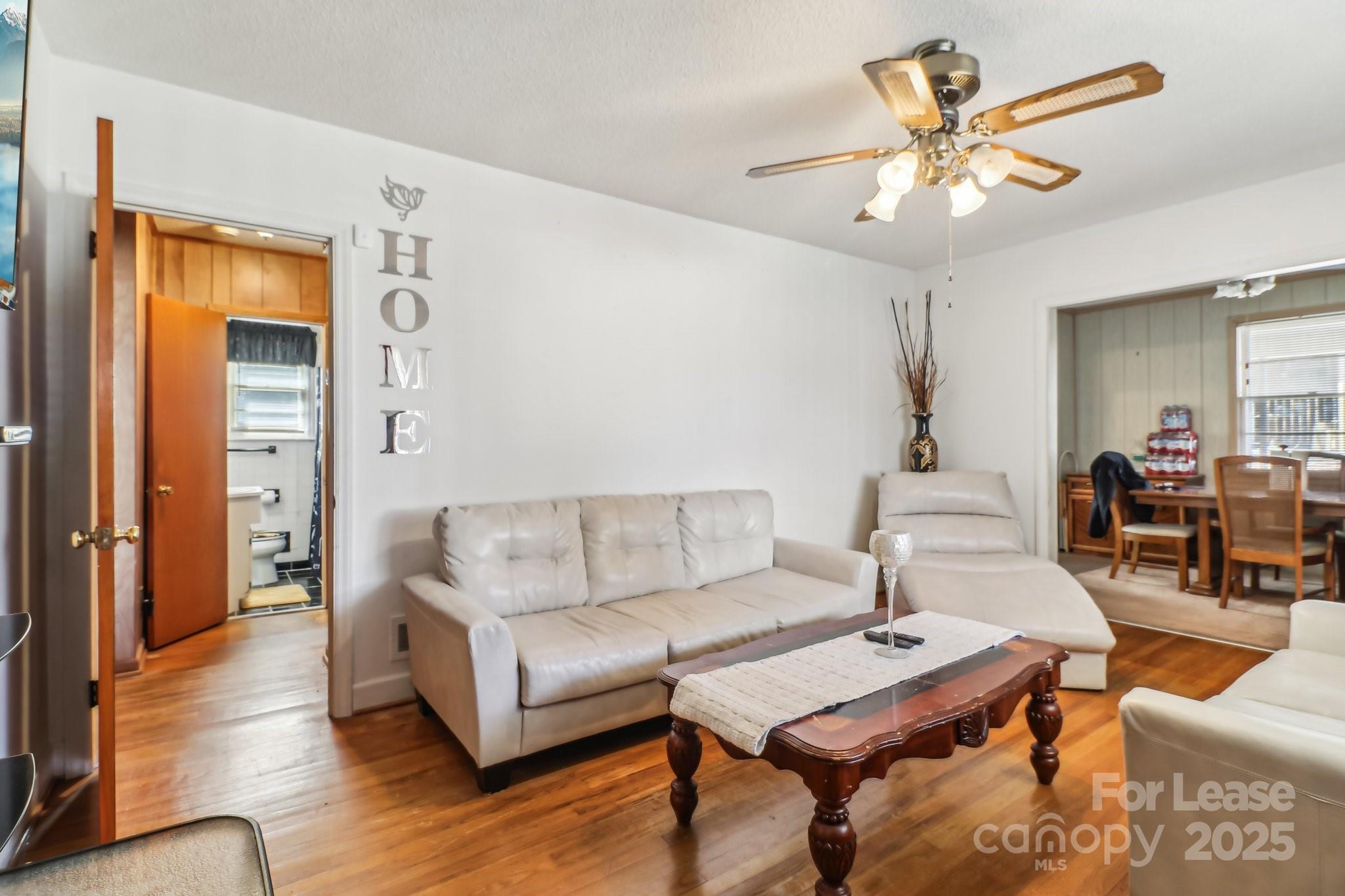 3422 Covenant Road Columbia, SC 29204 - Photo 6 of 27 a living room with furniture and wooden floor