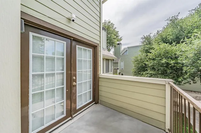 a view of a house with a large window