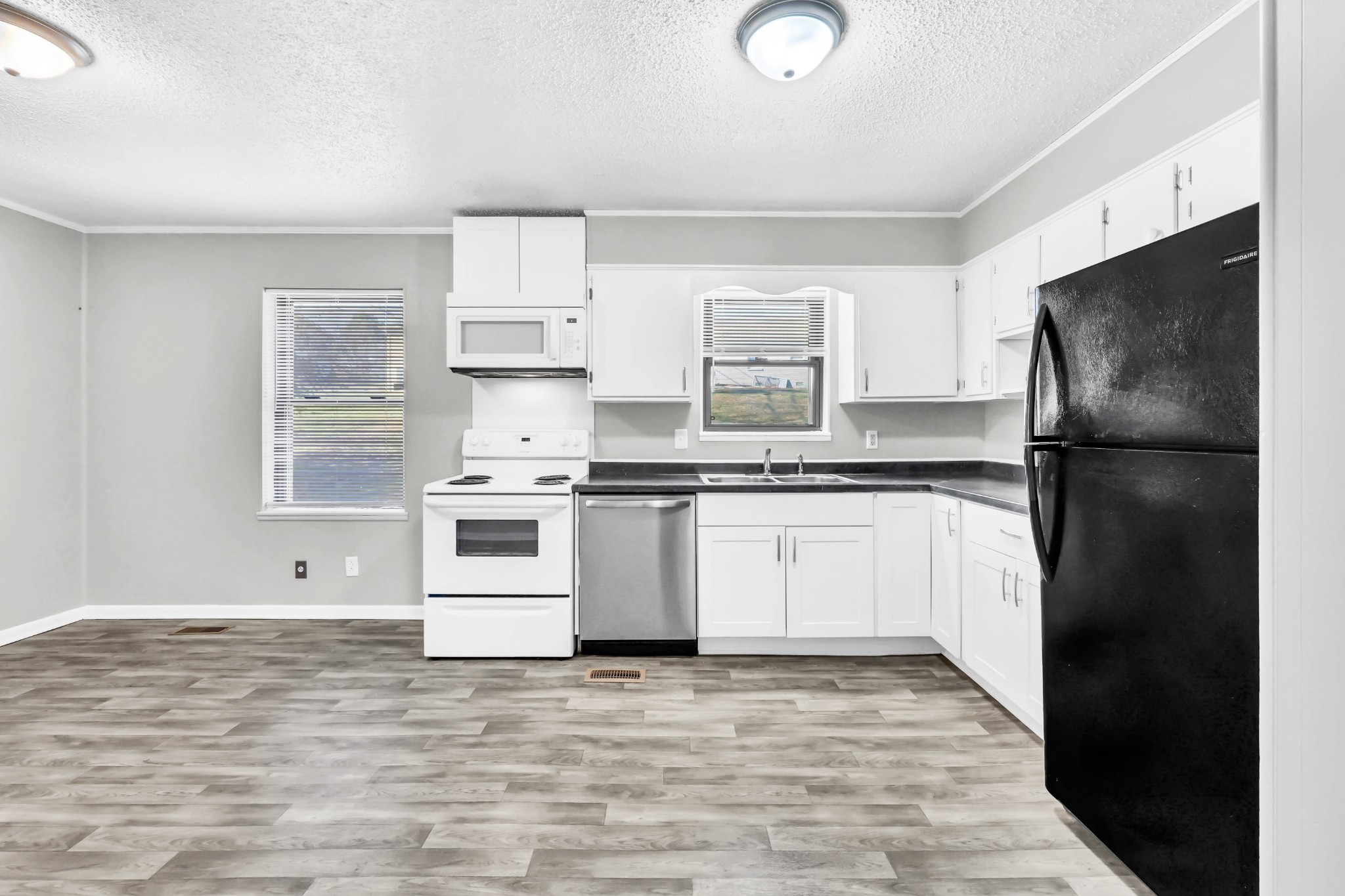 805 East 8th Avenue Springfield, TN 37172 - Photo 6 of 16 a kitchen with stainless steel appliances granite countertop a refrigerator and a stove