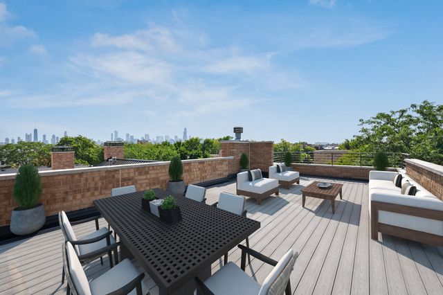 a view of a terrace with furniture