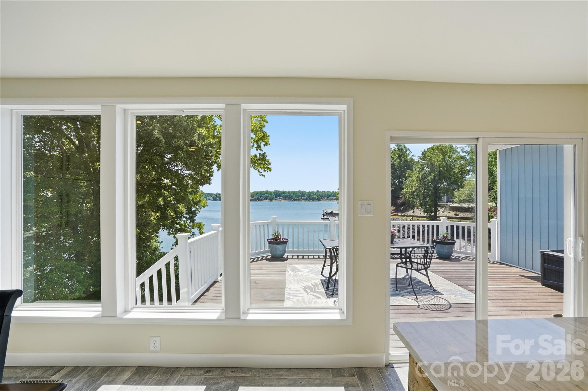 19011 Kailua Circle Tega Cay, SC 29708 - Photo 14 of 48 a view of a living room area with furniture and windows