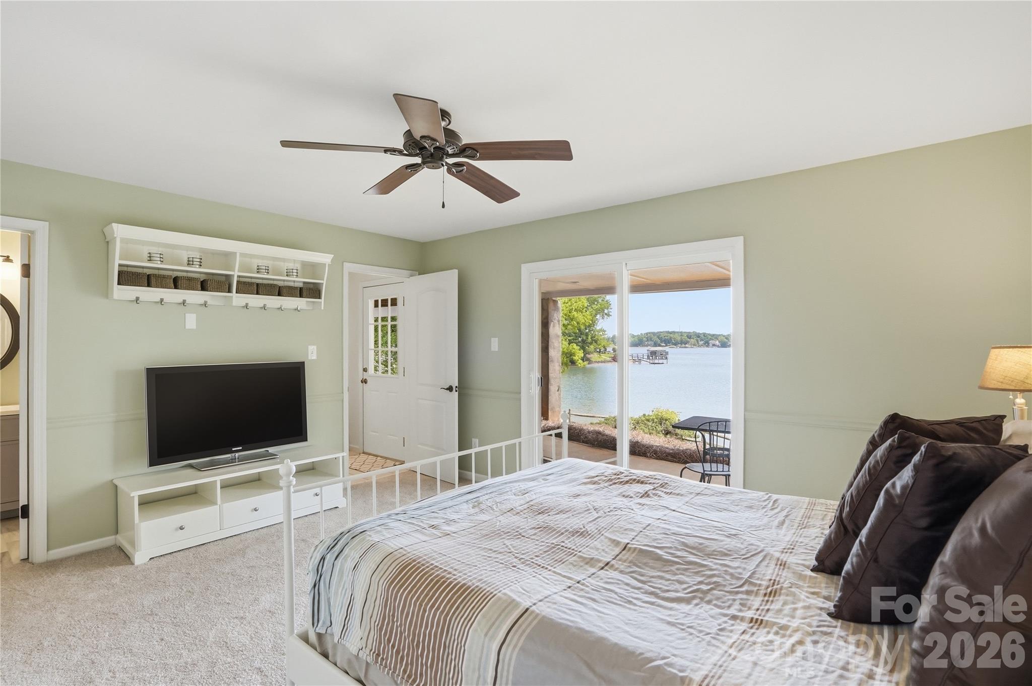 19011 Kailua Circle Tega Cay, SC 29708 - Photo 32 of 48 a bedroom with a bed and a flat screen tv