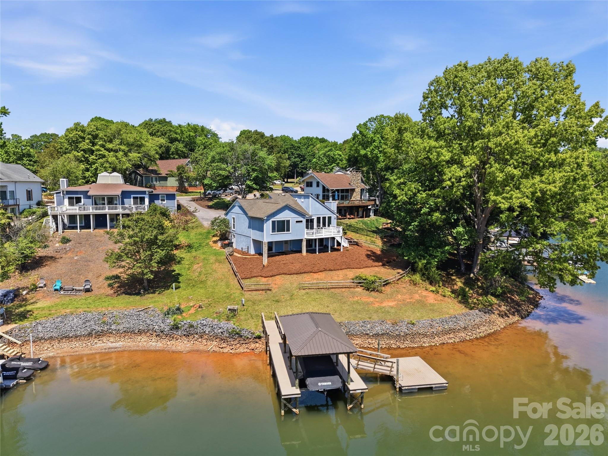 19011 Kailua Circle Tega Cay, SC 29708 - Photo 42 of 48 a view of a lake with a house