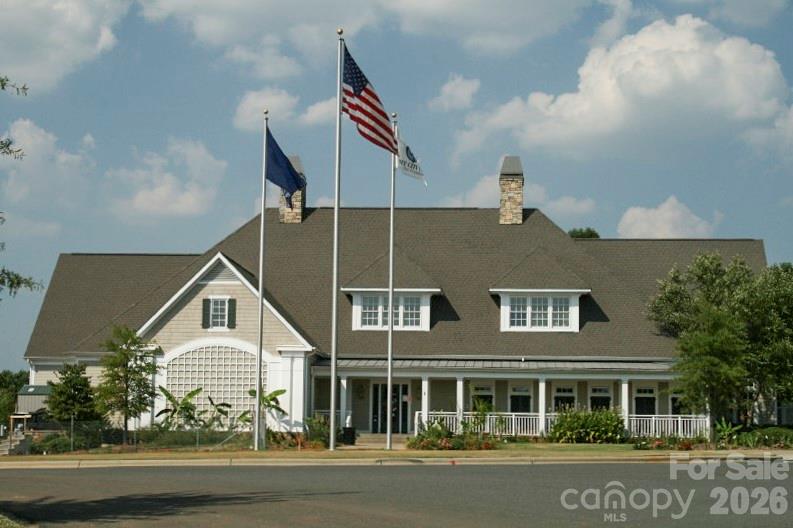 19011 Kailua Circle Tega Cay, SC 29708 - Photo 44 of 48 a front view of a house with a yard