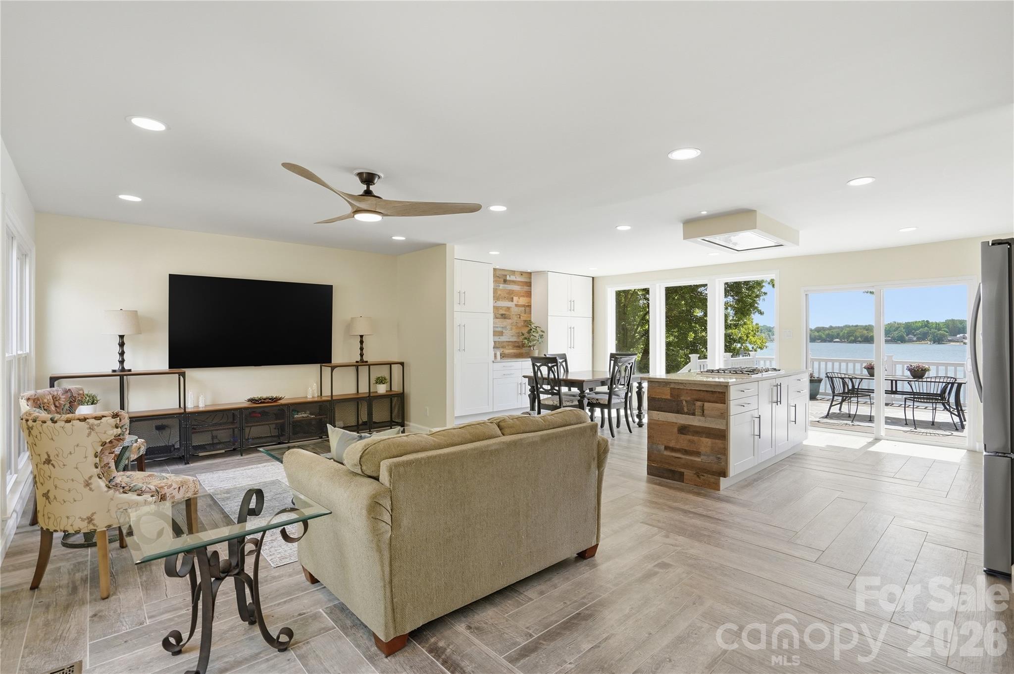 19011 Kailua Circle Tega Cay, SC 29708 - Photo 6 of 48 a living room with furniture and a flat screen tv