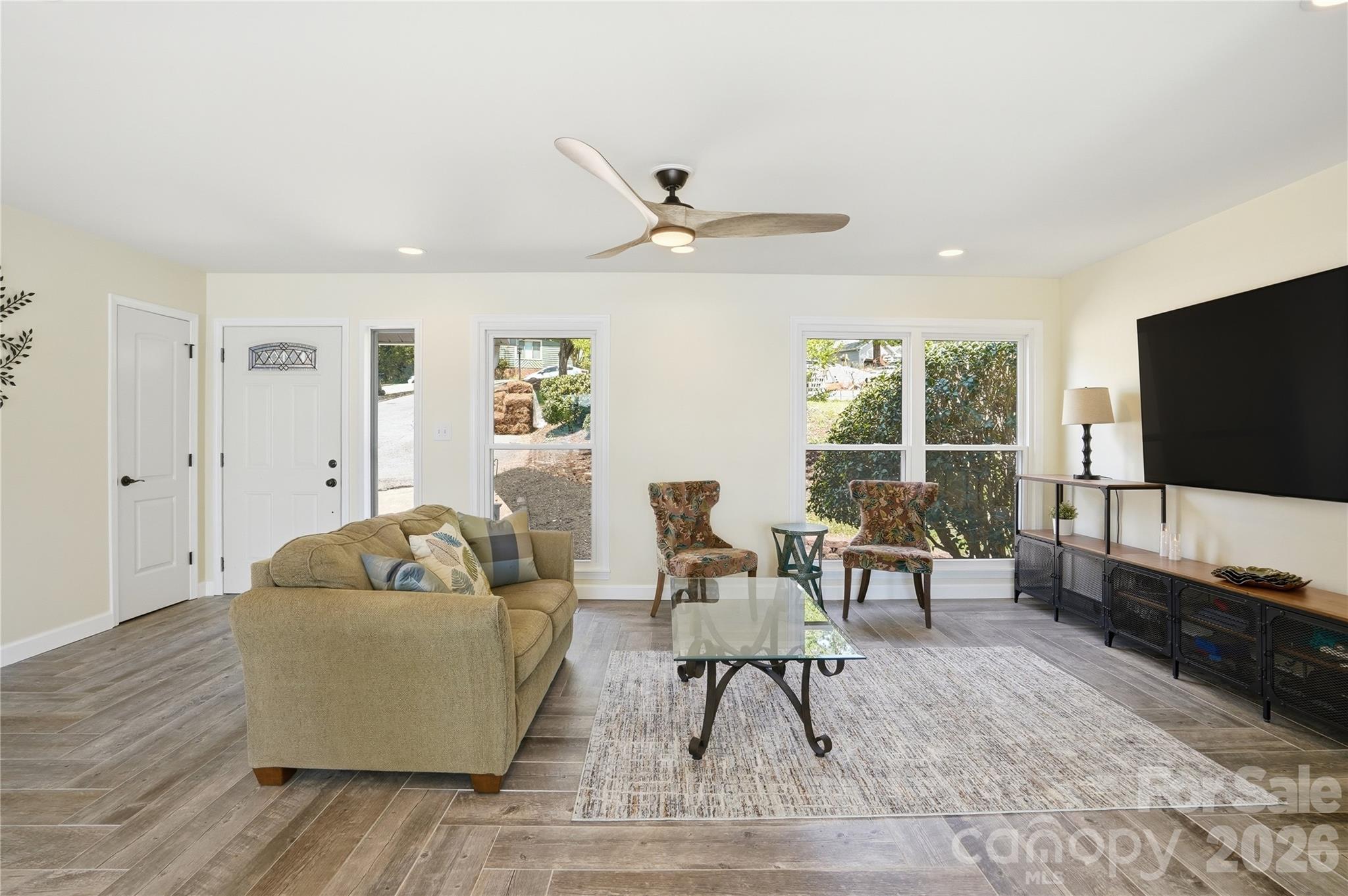 19011 Kailua Circle Tega Cay, SC 29708 - Photo 7 of 48 a living room with furniture and a flat screen tv