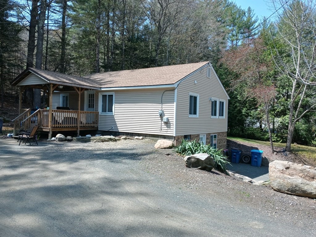 44 Littleville Road Huntington, MA 01050 - Photo 1 of 29 a front view of a house with a yard