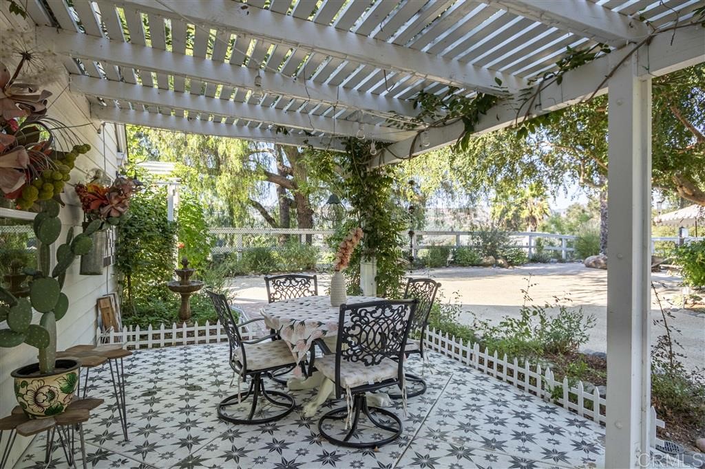 3945 Pala Mesa Drive Fallbrook, CA 92028 - Photo 14 of 23 a view of a porch with chairs and backyard