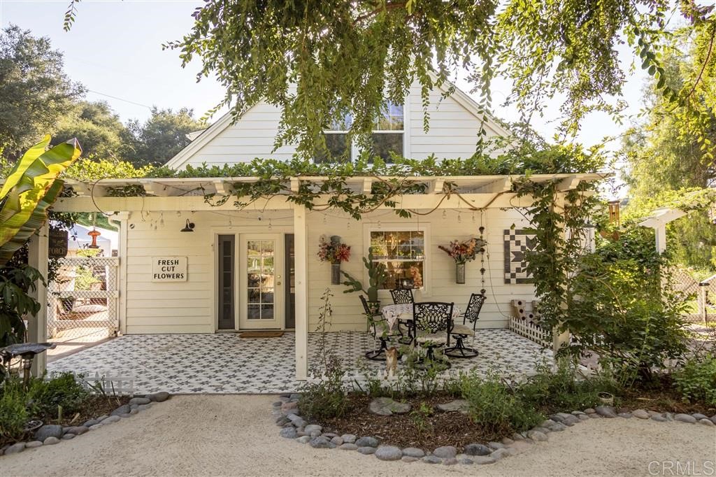 3945 Pala Mesa Drive Fallbrook, CA 92028 - Photo 16 of 23 a front view of a house with a tree