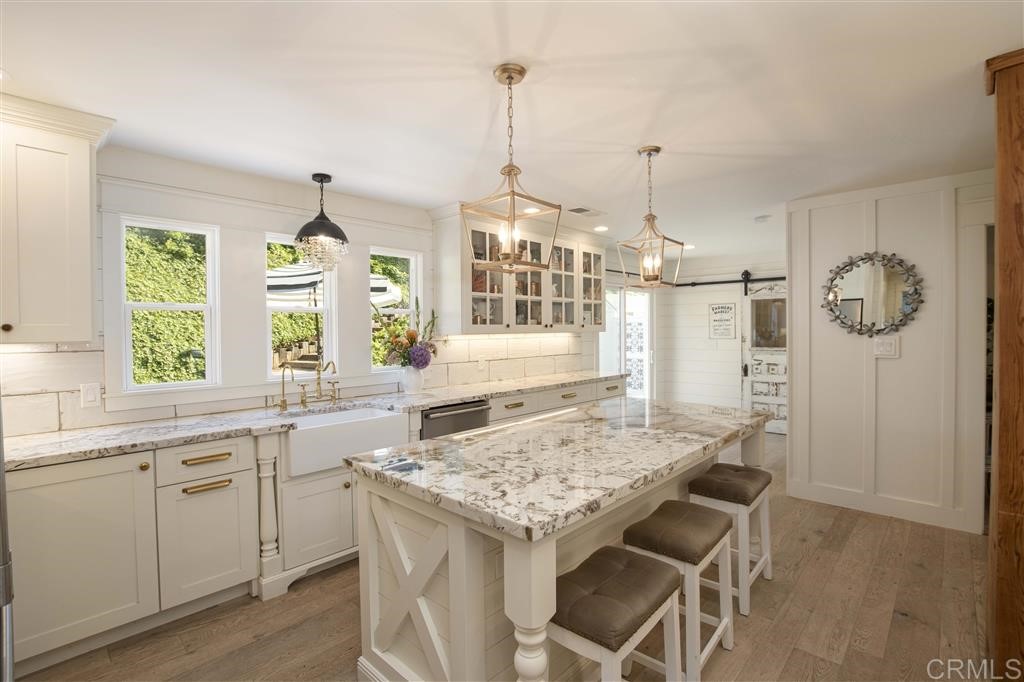 3945 Pala Mesa Drive Fallbrook, CA 92028 - Photo 5 of 23 a kitchen with a table and chairs in it