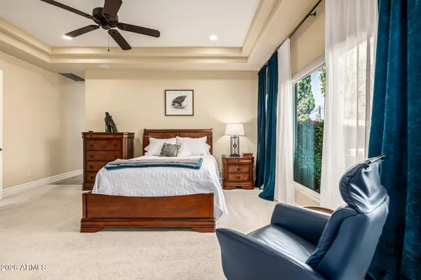 a bath tub sitting next to a window