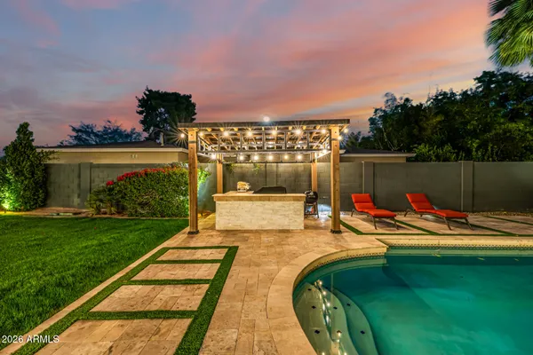 a view of storage and utility room with washer and dryer