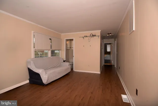 a room with a bed and a window