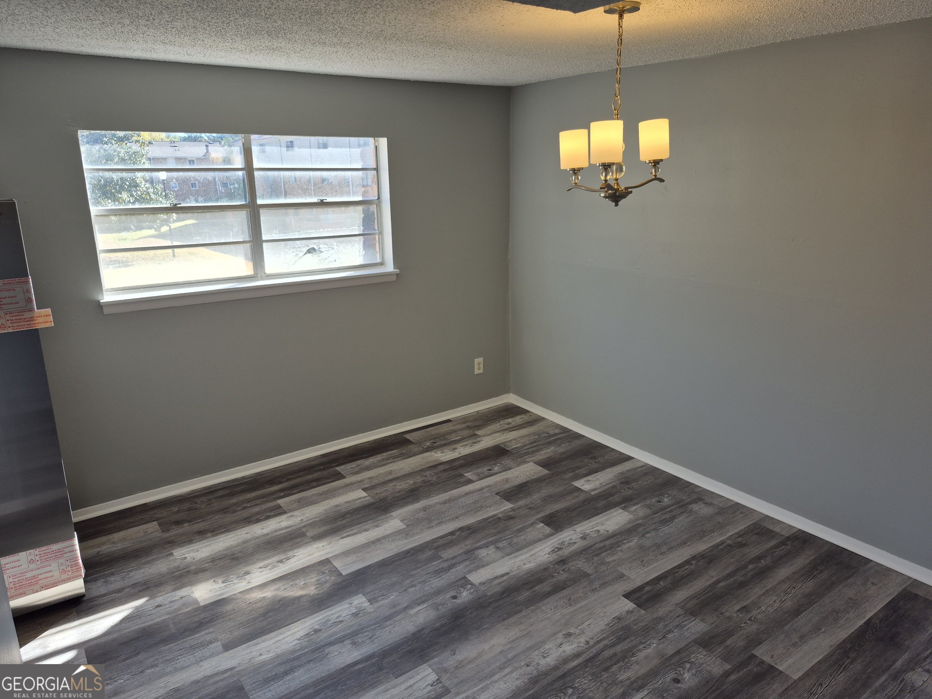 4701 Flat Shoals Road, Unit 49C Union City, GA 30291 - Photo 9 of 12 a view of empty room with window