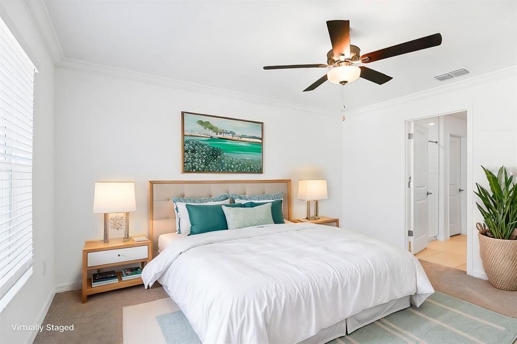 13755 Big Hawk Way Lithia, FL 33547 - Photo 20 of 33 a bedroom with a bed and a potted plant