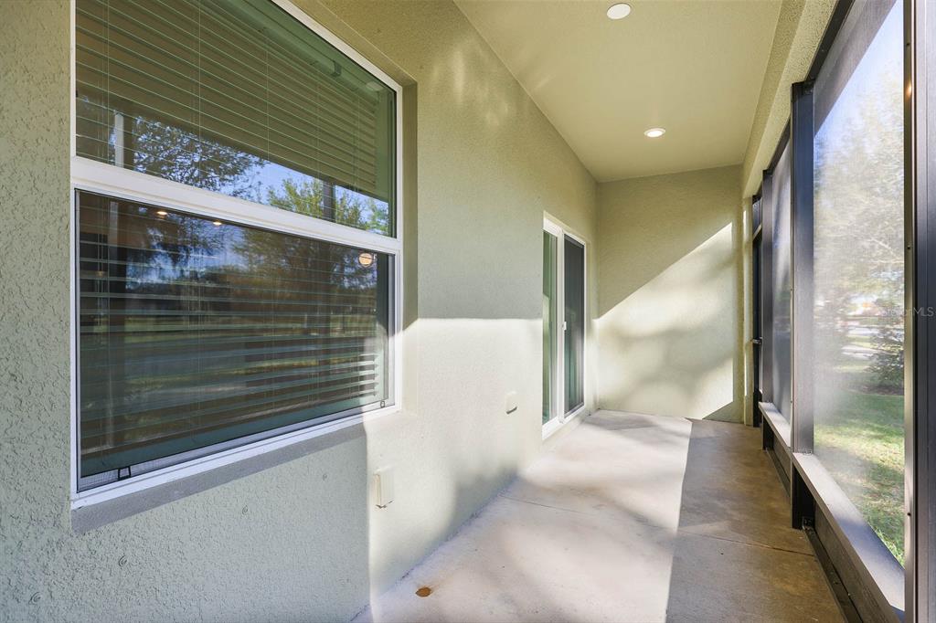 13755 Big Hawk Way Lithia, FL 33547 - Photo 30 of 33 a view of a hallway with windows
