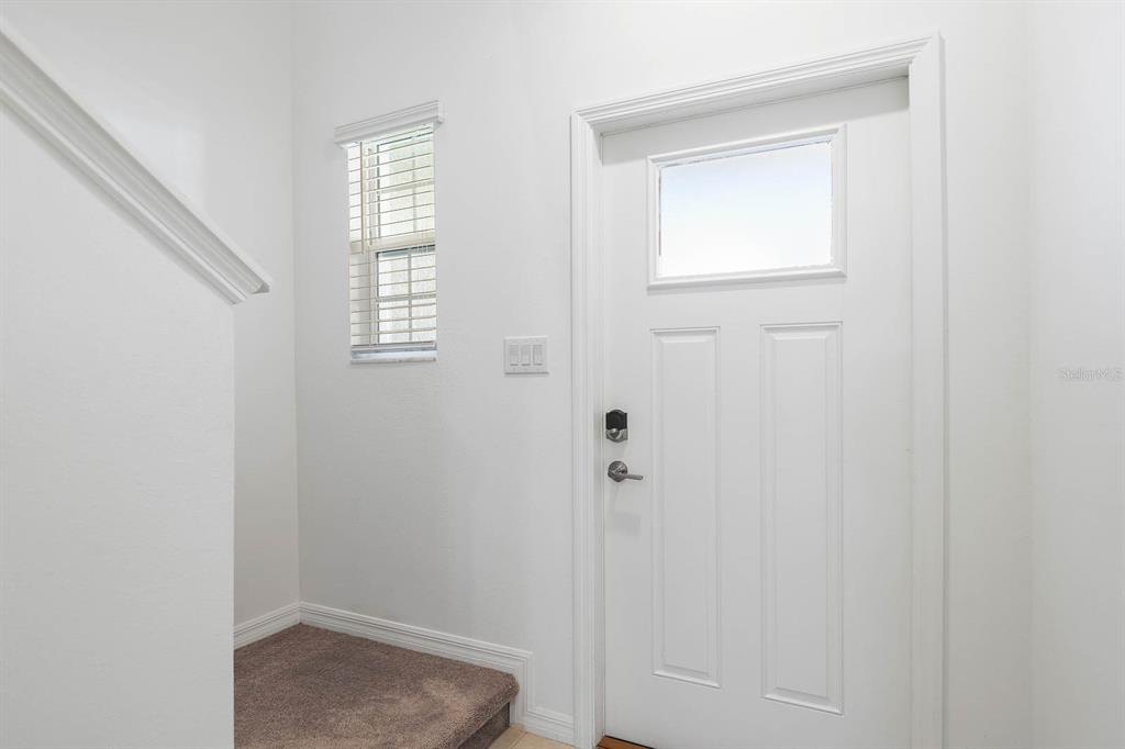 13755 Big Hawk Way Lithia, FL 33547 - Photo 5 of 33 a bathroom with a shower
