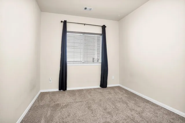 a bathroom with a toilet a sink and bathtub