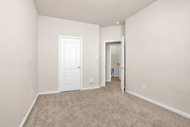 a view of a room with a window