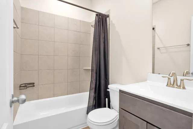 an empty room with closet area