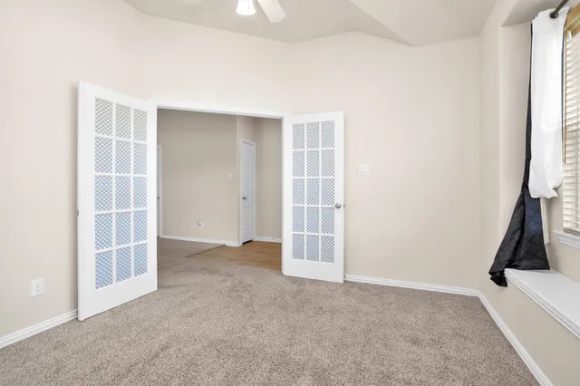 an empty room with windows